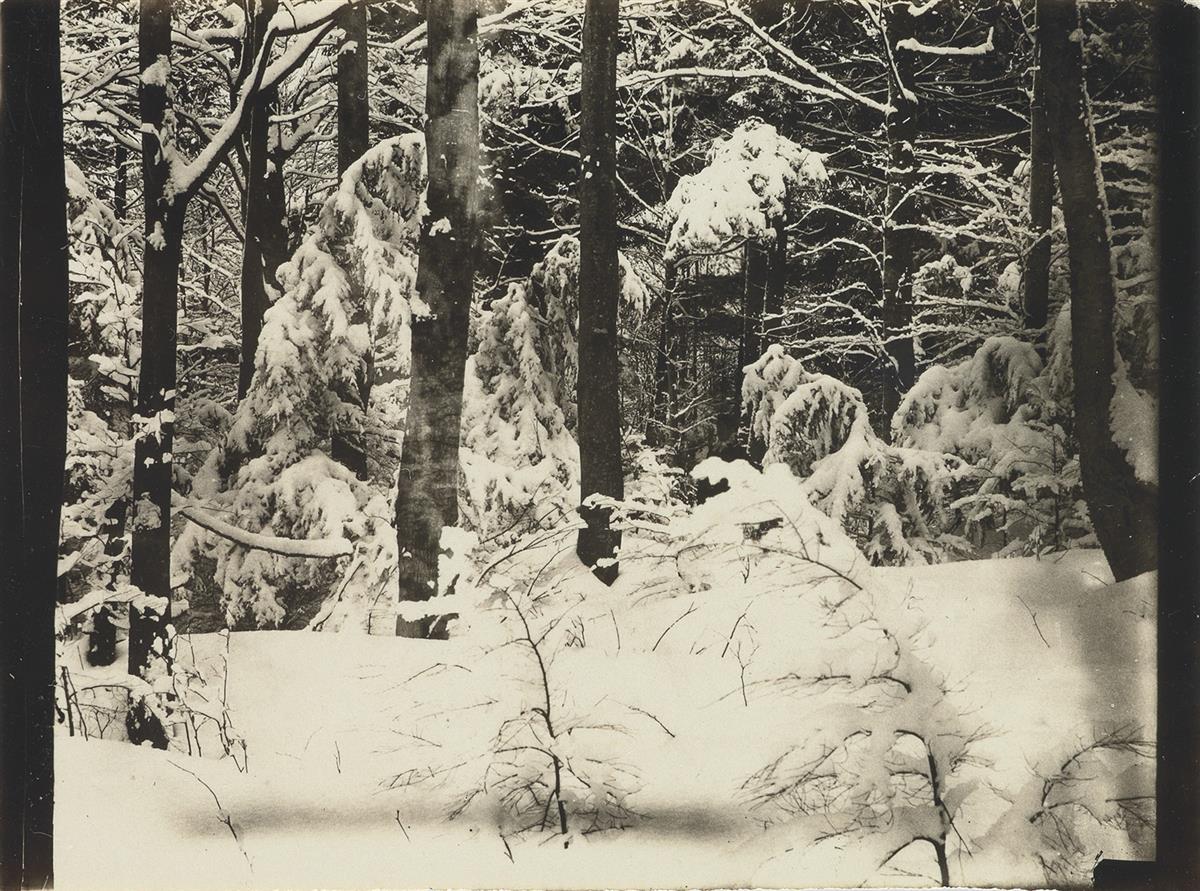WILSON A. SNOWFLAKE BENTLEY (1865-1931) Group of 4 photographs, comprising two snowy landscapes and a pair of cloud studies.